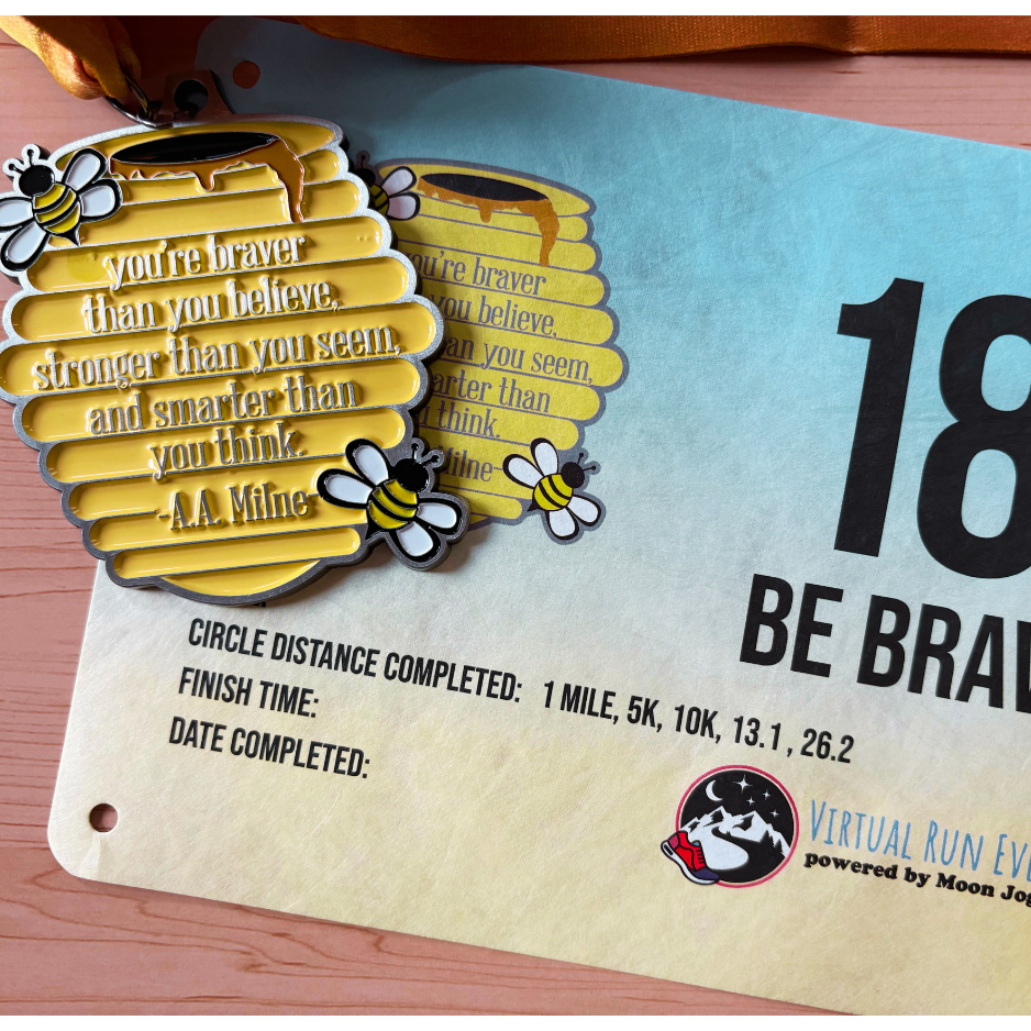 VirtualRunEvent 2026 Be Brave medal for 1M, 5K, 10K, half, and full marathon, with colorful design and engraved event details.