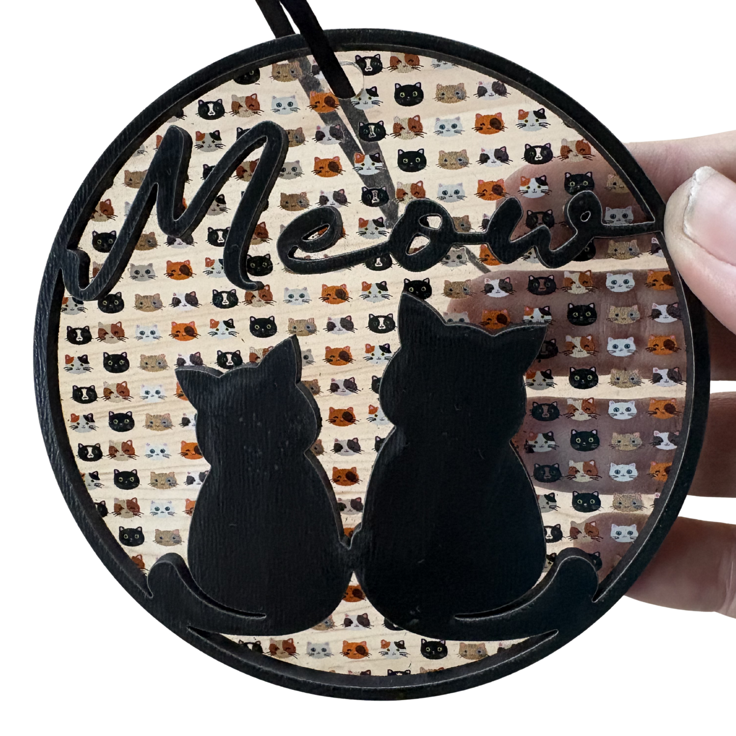 Layered wood and acrylic cat ornament featuring a playful design, perfect for cat lovers and holiday decor.
