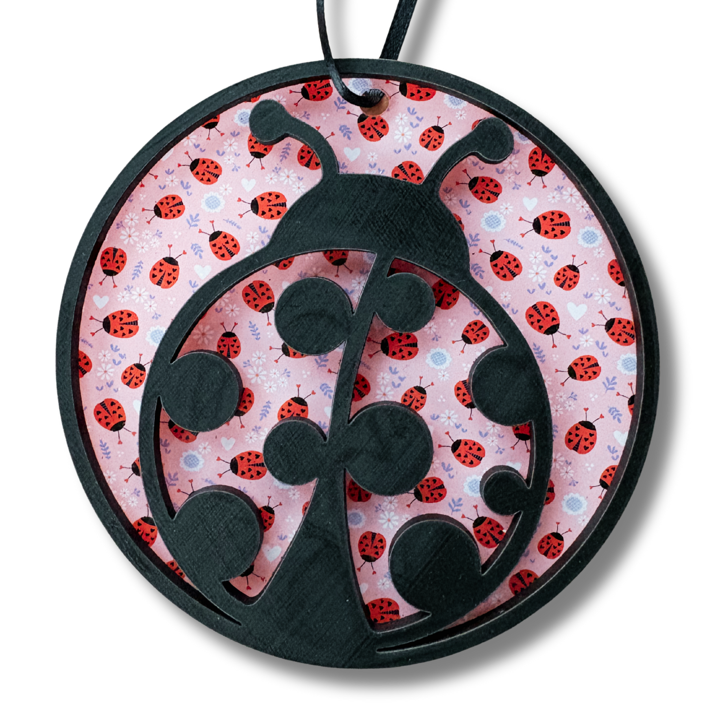 Decorative ladybug medal with layered wood and printed acrylic, featuring a 3.75-inch round design for garden or spring decor.