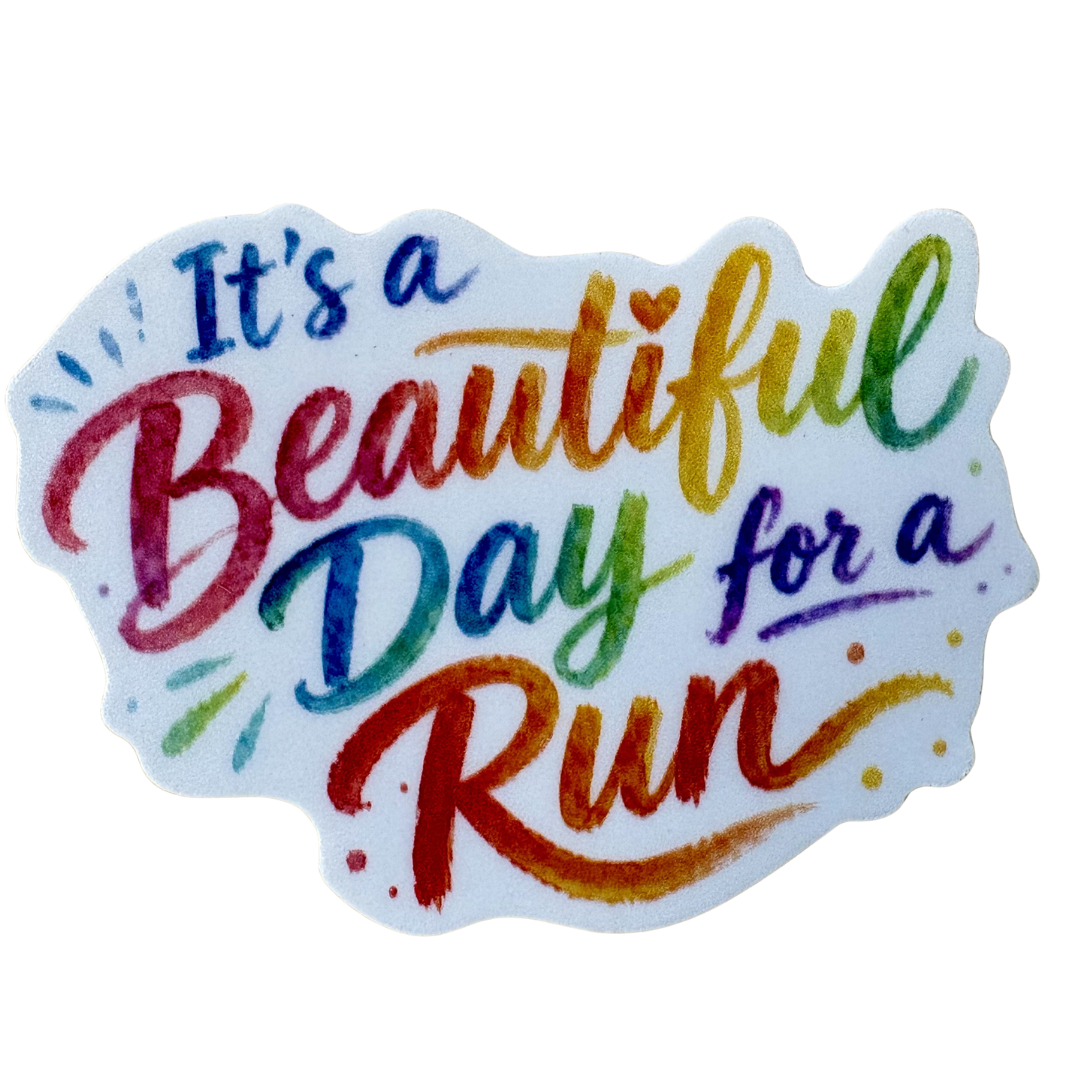 Medal with "Beautiful Day for a Run" sticker from virtualrunevent, featuring a colorful design and a ribbon for wearing.