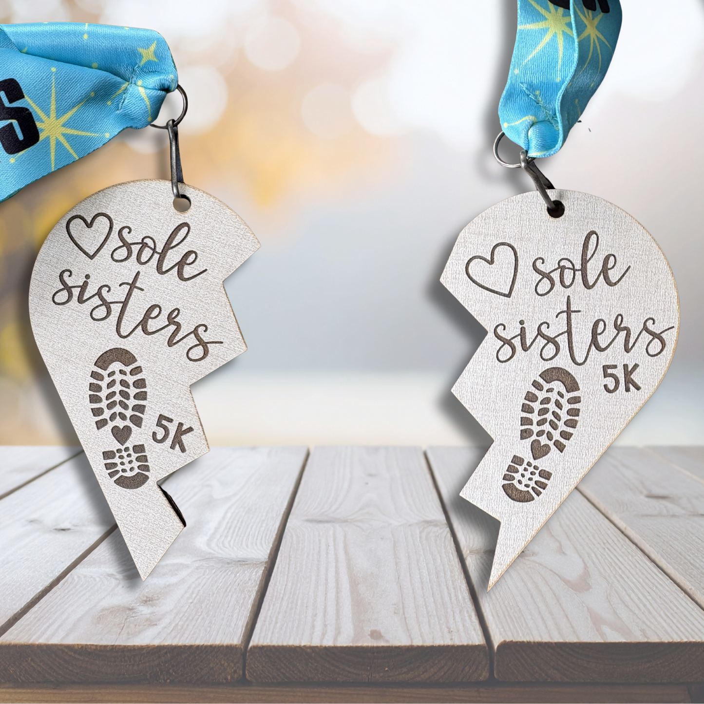 Virtualrunevent Sole Sisters 5K virtual race medal with engraved design and colorful ribbon for celebrating the event.
