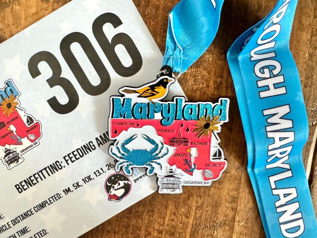 Collection of 50 virtual run medals and bibs for the Race Through America 50 State Challenge by virtualrunevent.