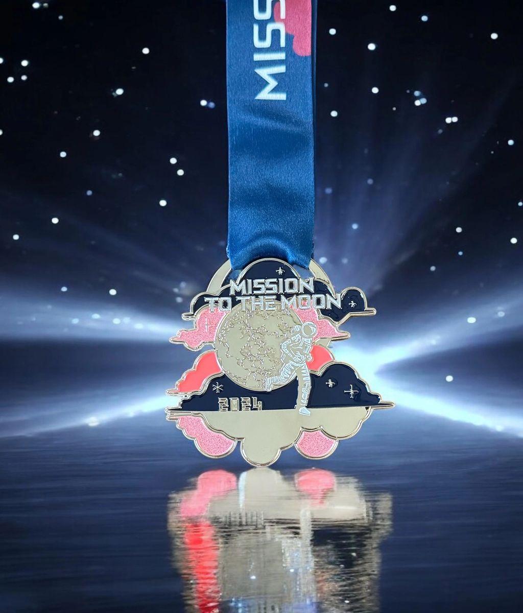 Medal for the Mission to the Moon Running and Walking Challenge by virtualrunevent, featuring a space-themed design.