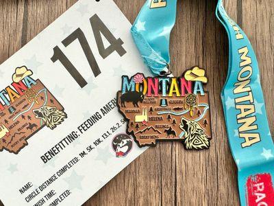 Virtualrunevent Race Through America 50 State Challenge medals and bibs displayed on a white background.