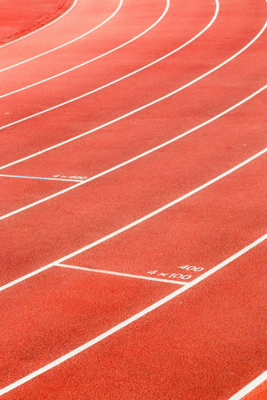 red running track lane markings