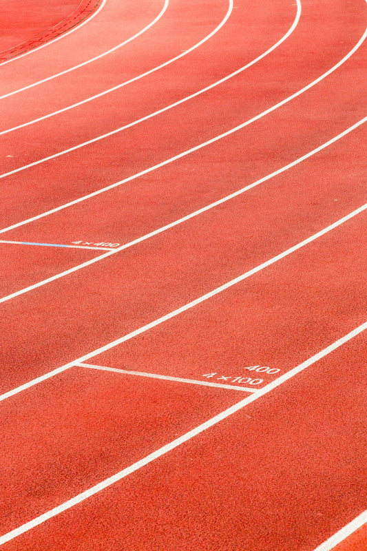 red running track lane markings