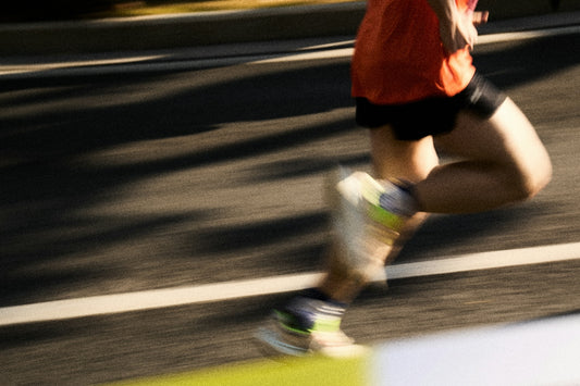 Runner in motion on a street