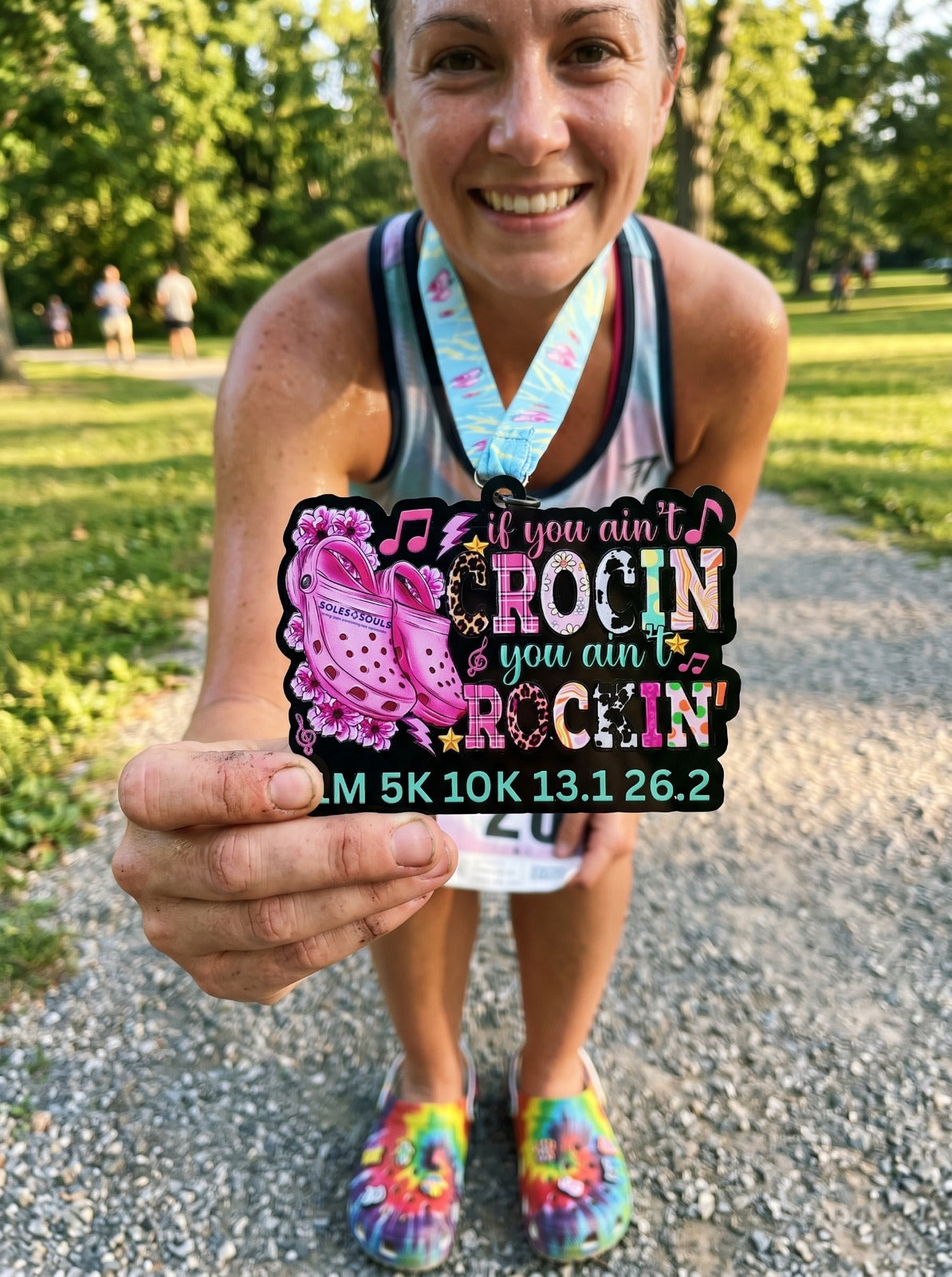 Virtualrunevent "If You Ain’t Crocin’, You Ain’t Rockin’" medal for the virtual race, featuring bold text and vibrant design.