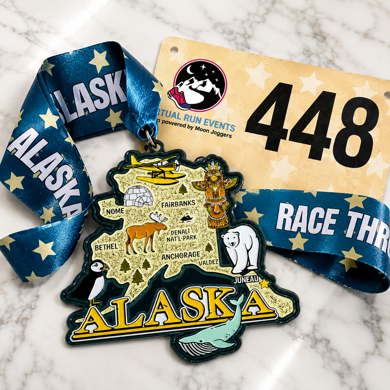 Alaska running medal for virtual race, featuring mountains and wildlife, awarded for 5K, 10K, half marathon, marathon, or 50 miles.