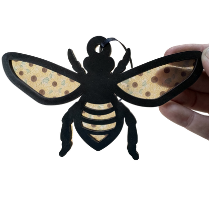 Layered wood and acrylic Bee and Sunflowers ornament medal by Virtual Rune Event, showcasing intricate floral designs.