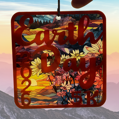 Gold medal for the 2026 Earth Day 5K virtual race benefiting Wild Earth Allies, featuring Earth and runner motifs.