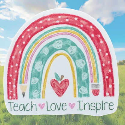 VirtualRuneEvent Teach Love Inspire medal sticker featuring engraved text on a round metal medal with colorful ribbon.