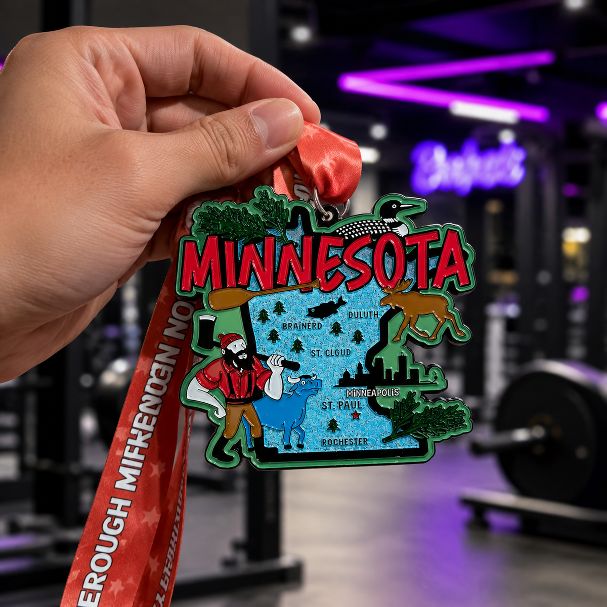 Virtualrunevent Minnesota Race medal featuring a hand holding a colorful design for 5K, 10K, half marathon, and 50-mile challenges.