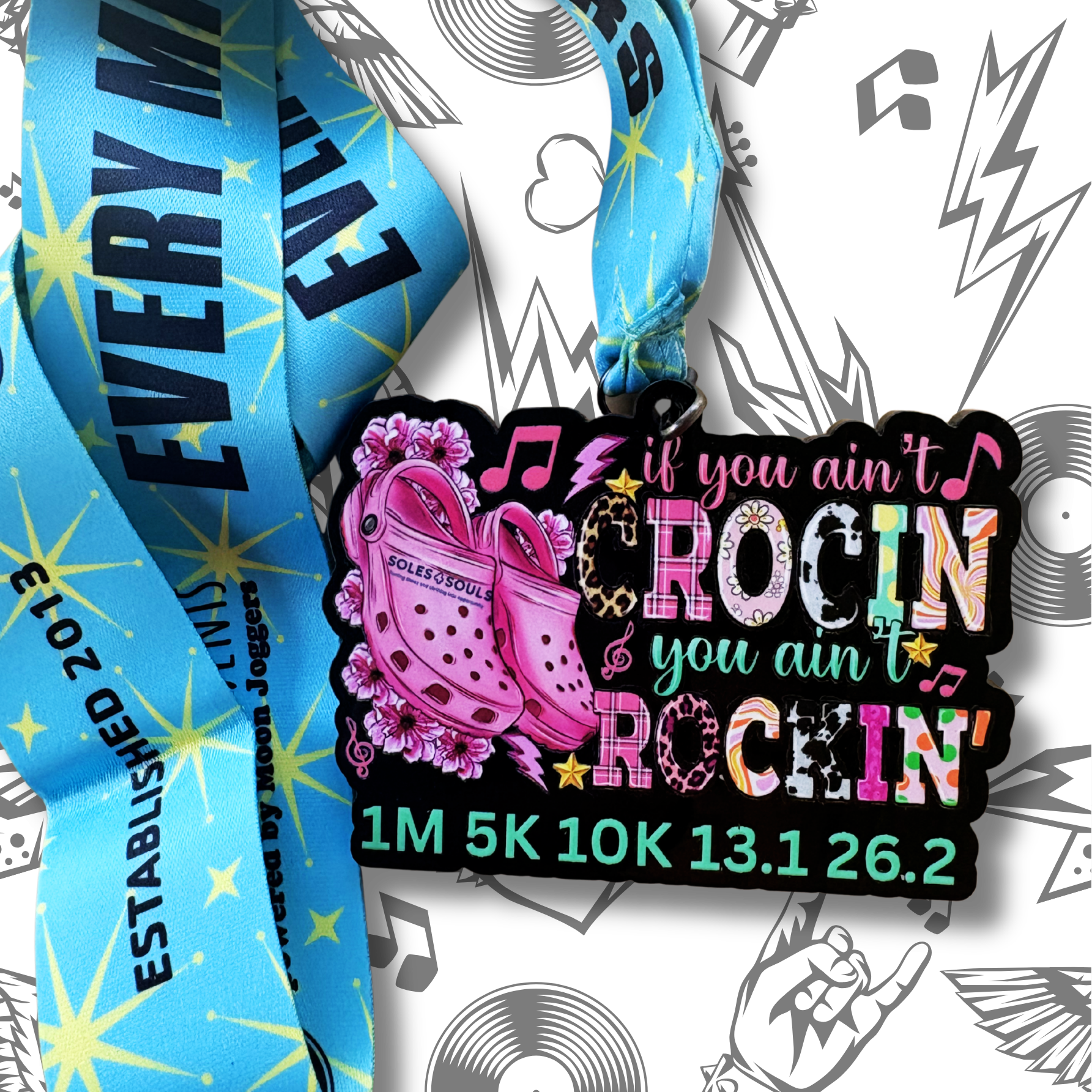 Virtualrunevent "If You Ain’t Crocin’, You Ain’t Rockin’" medal featuring a colorful design with race branding and vibrant graphics.
