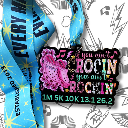 Virtualrunevent "If You Ain’t Crocin’, You Ain’t Rockin’" medal featuring a colorful design with race branding and vibrant graphics.