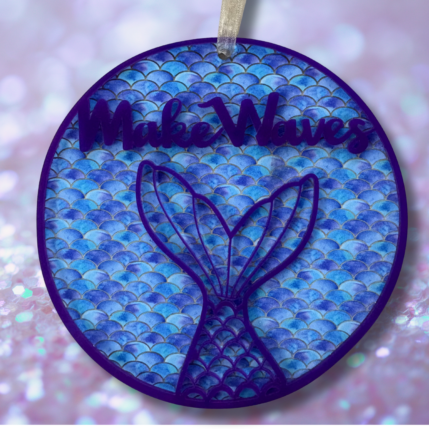 Layered acrylic mermaid ornament featuring ocean design, perfect for beach-themed holiday decor.