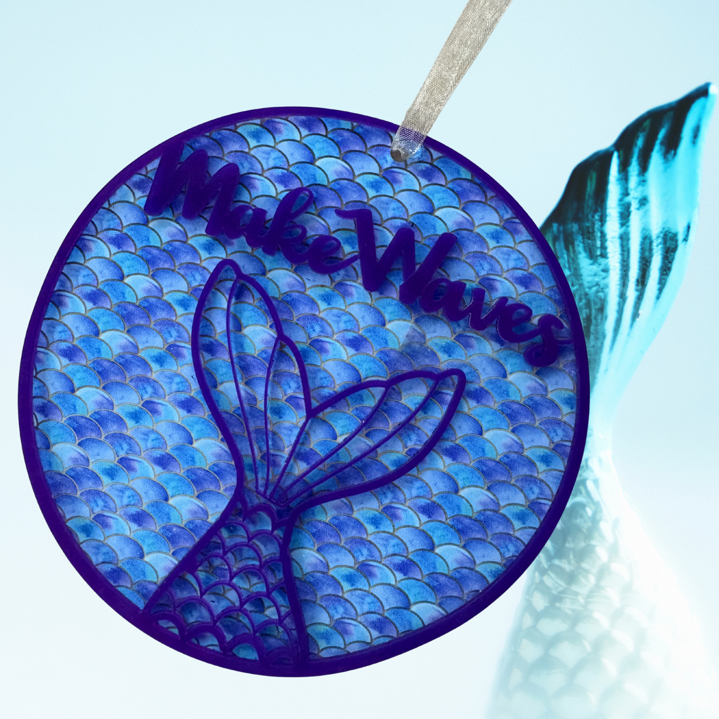 Layered acrylic mermaid ornament with ocean decor, perfect for beach-themed Christmas and coastal holiday decorations.