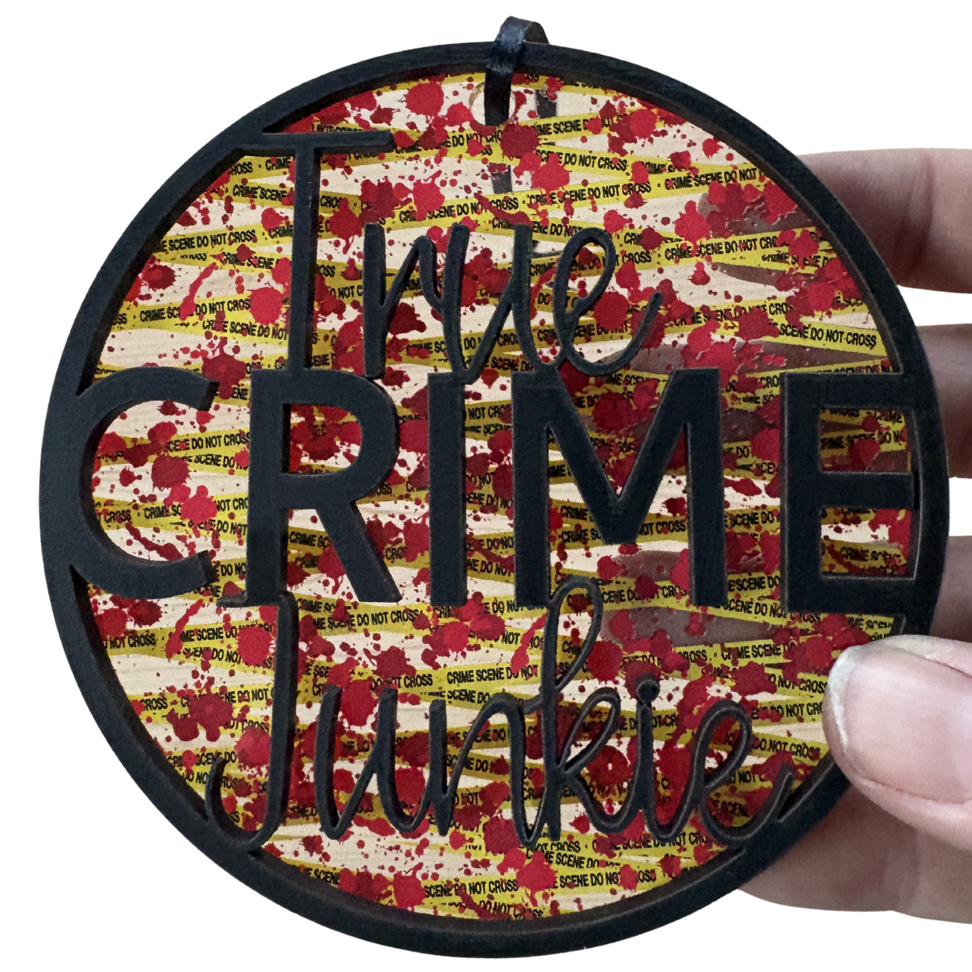 Layered wood and acrylic True Crime Junkie ornament, 3.75 inches, featuring crime scene decor design.