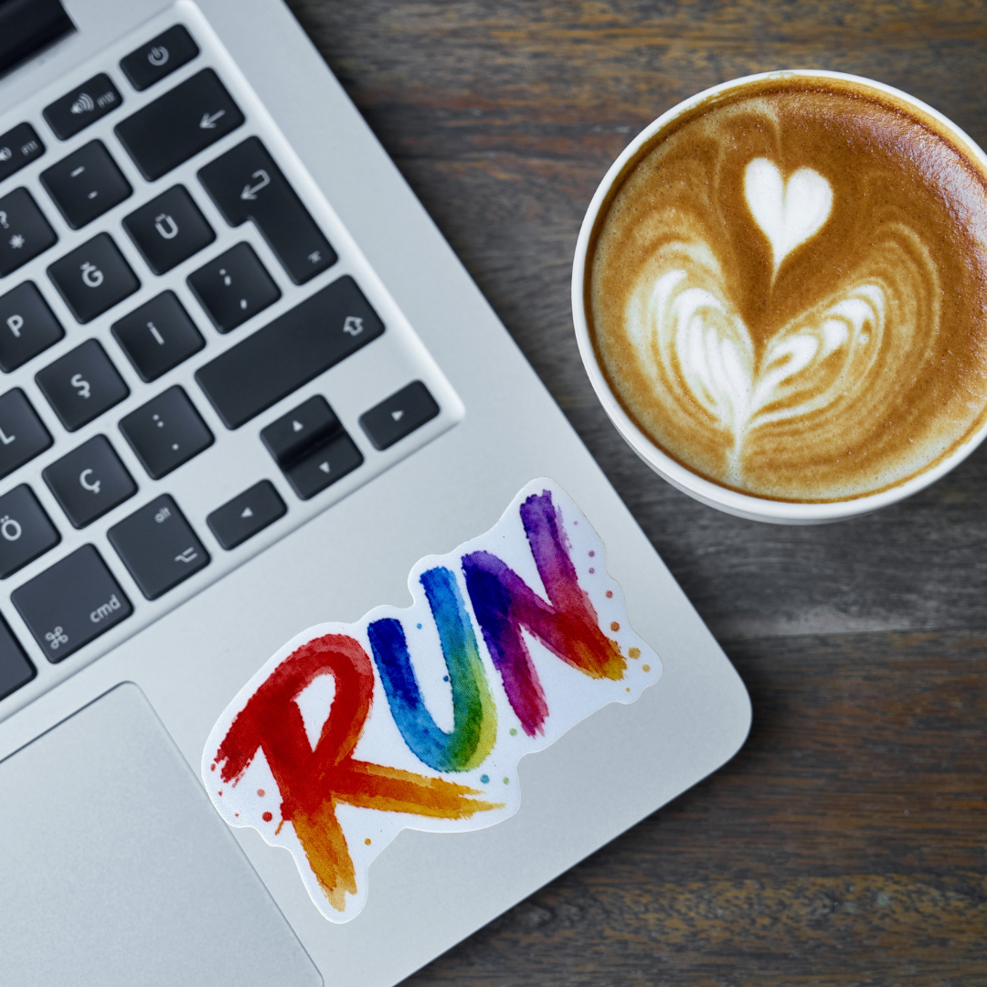 Colorful "RUN" medal sticker from VirtualRunEvent, featuring vibrant design and bold lettering for athletic achievements.
