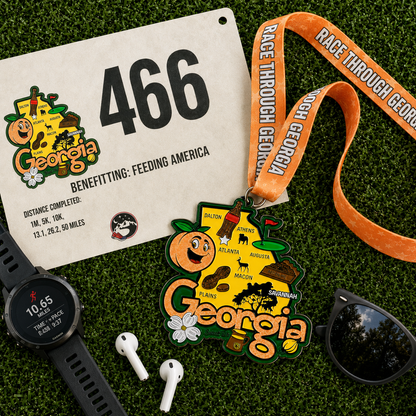 Virtualrunevent Race Through Georgia medal with colorful design, featuring race distances like 1M, 5K, and 10K on a flat lay image.