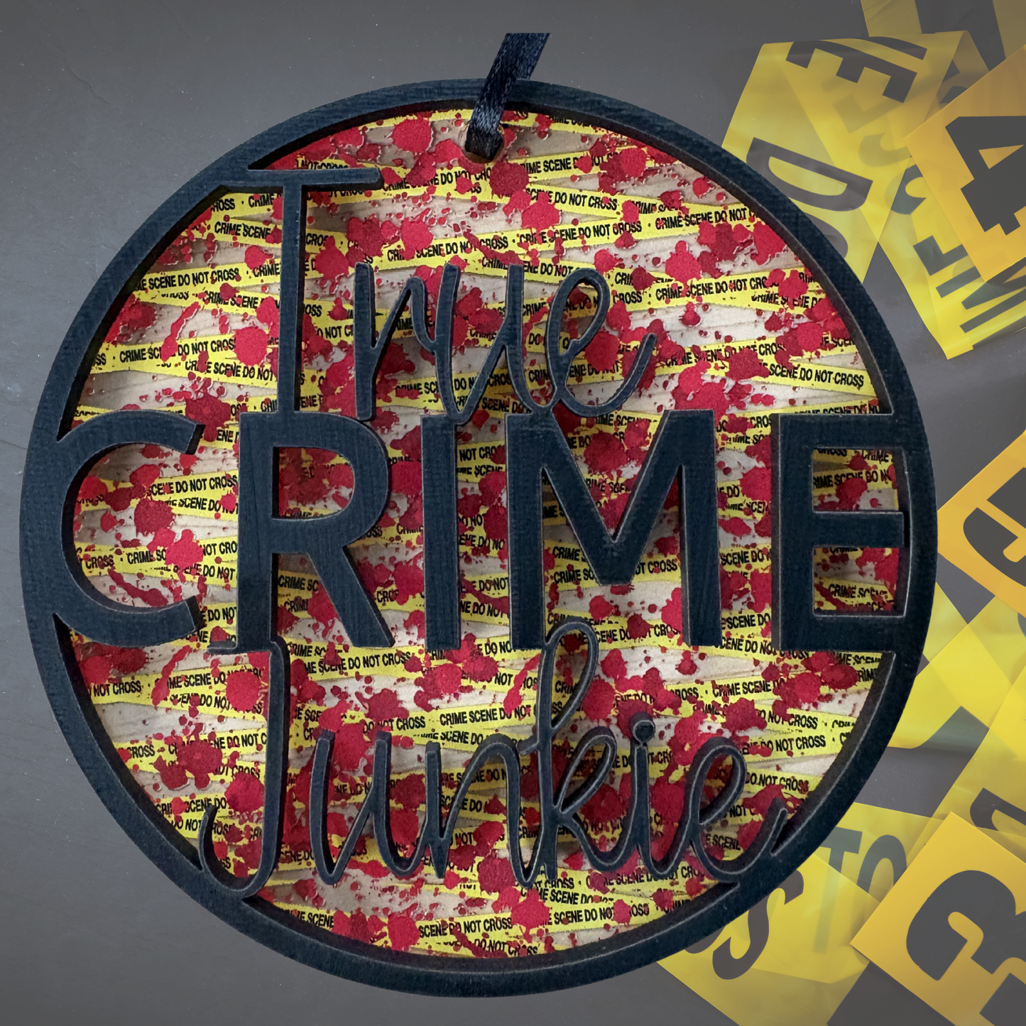 Layered wood and acrylic True Crime Junkie ornament, 3.75 inch, featuring crime scene decor design.