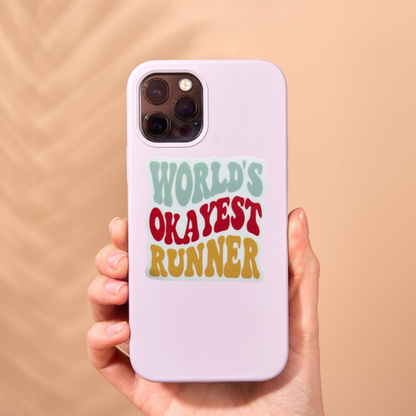 Sticker featuring the "World’s Okayest Runner" slogan from VirtualRunEvent, with bold text on a clear background.