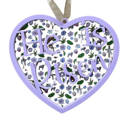 Acrylic "He Is Risen" ornament medal with layered design, 3.75-inch heart shape, perfect for spring garden or nature decor.