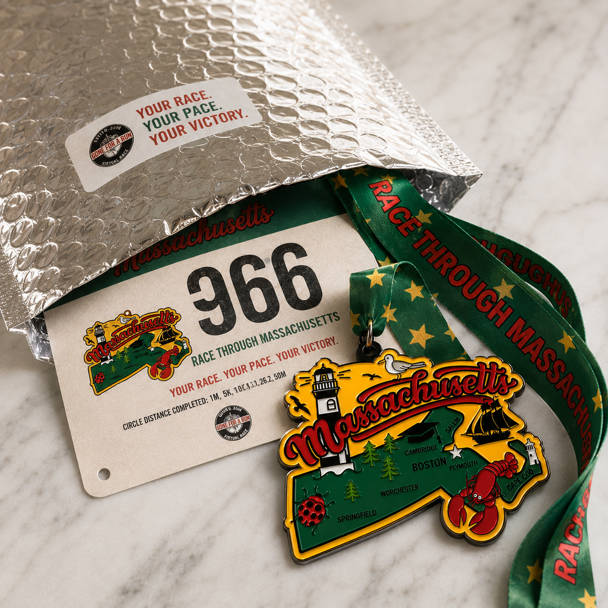 Virtualrunevent Massachusetts race medal and bib, featuring a colorful design for 1M, 5K, 10K, 13.1, and 26.2 distances.