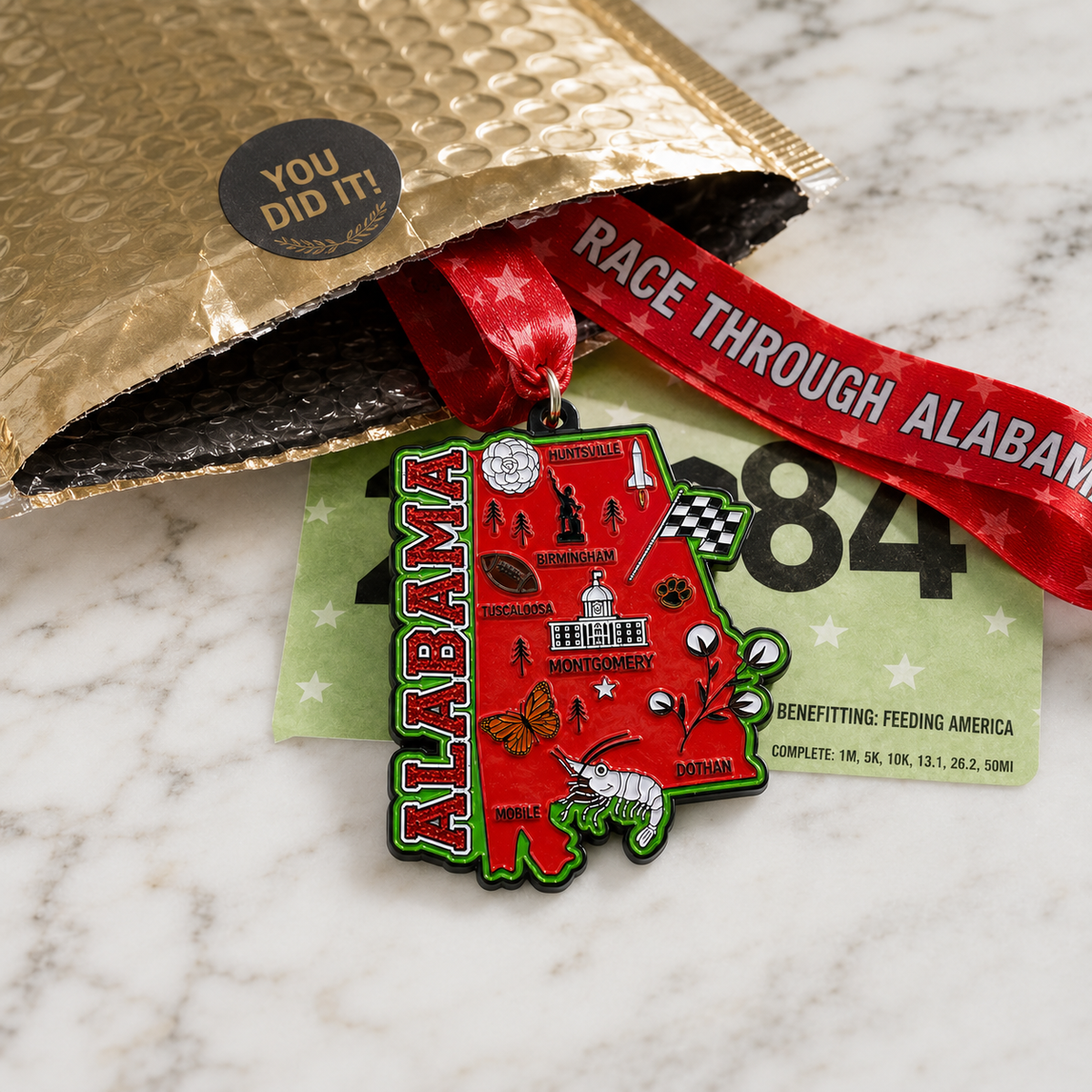 Virtualrunevent Race Through Alabama medal featuring regional design, awarded for completing 5K, 10K, half marathon, or 50-mile challenge.