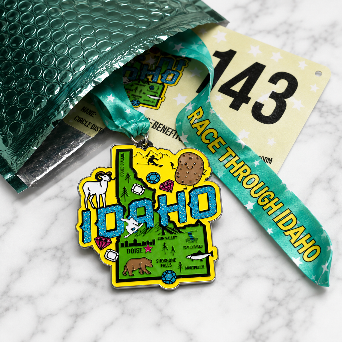 Virtualrunevent Race Through Idaho medal featuring Idaho state outline and race details, designed for 5K, 10K, half marathon, and 50 mile challenge.