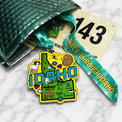 Virtualrunevent Race Through Idaho medal featuring Idaho state outline and race details, designed for 5K, 10K, half marathon, and 50 mile challenge.
