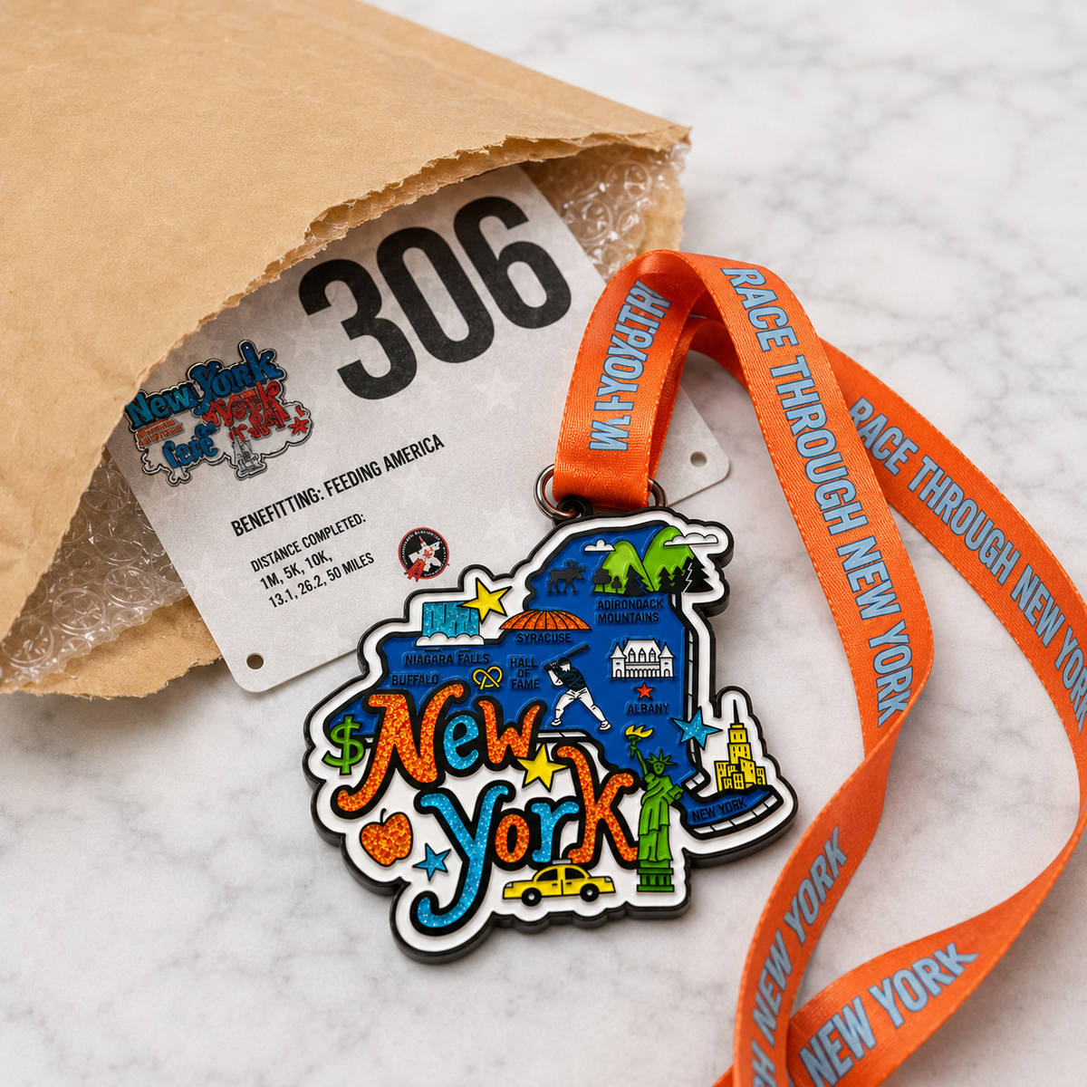 Virtualrunevent Race Through New York medal featuring city skyline design for 5K, 10K, Half Marathon, and 50 Mile Challenge.