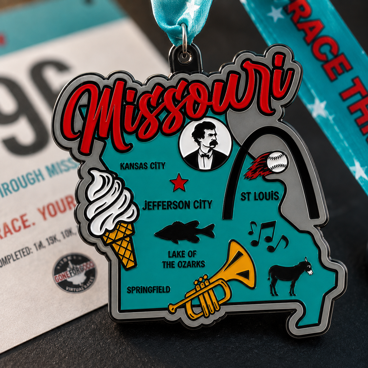 Close-up of virtualrunevent Race Through America 50 State Challenge medals and bibs, showcasing colorful medals representing all 50 states.