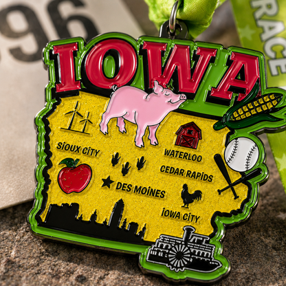 Close-up of VirtualRunEvent Race Through Iowa medal showing detailed design for 5K, 10K, Half Marathon, and 50 Mile Challenge finisher reward