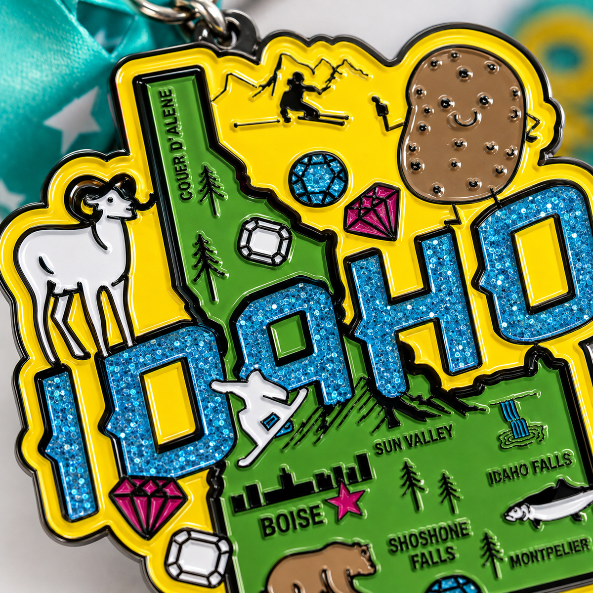 Close-up of Virtualrunevent Race Through Idaho medal featuring Idaho landscape and race details for 5K, 10K, half marathon, and 50 mile challenge