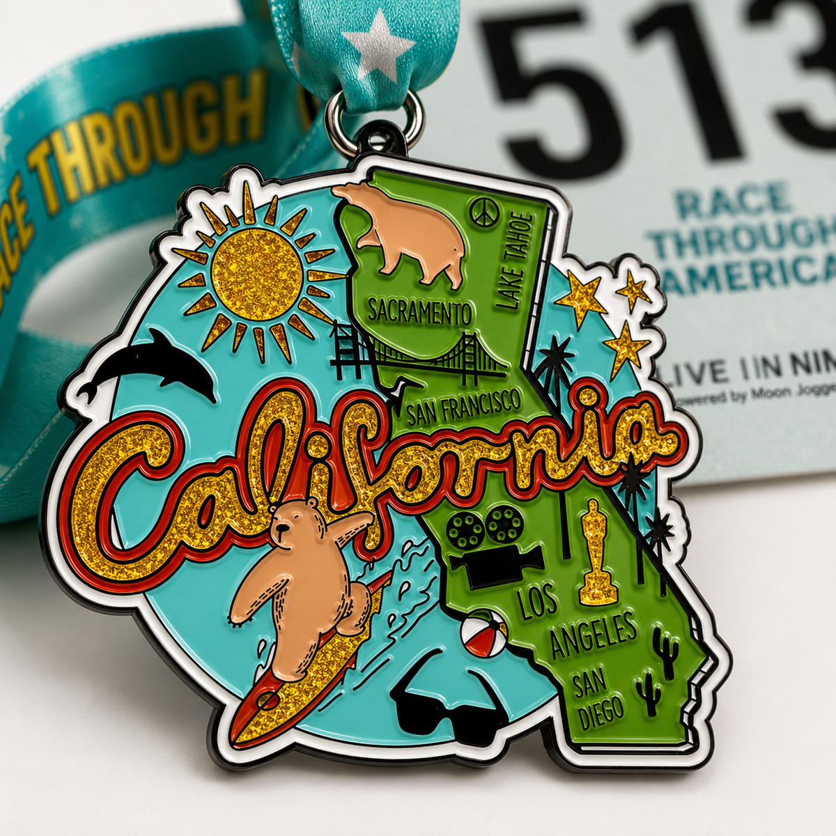 Close-up of VirtualRunEvent Race Through California medal featuring California landscapes and event branding for 5K, 10K, and marathon challenges.