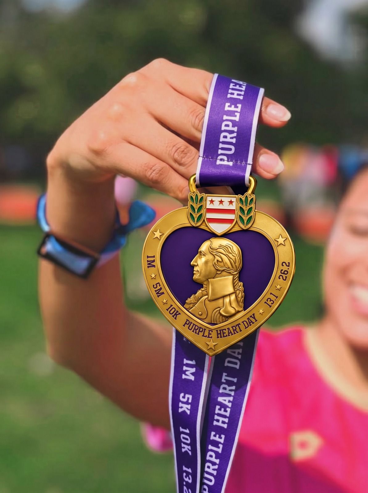 Purple Heart Day Virtual Race 2026 logo with race distances 1M, 5K, 10K, half, and full marathon, organized by virtualrunevent.